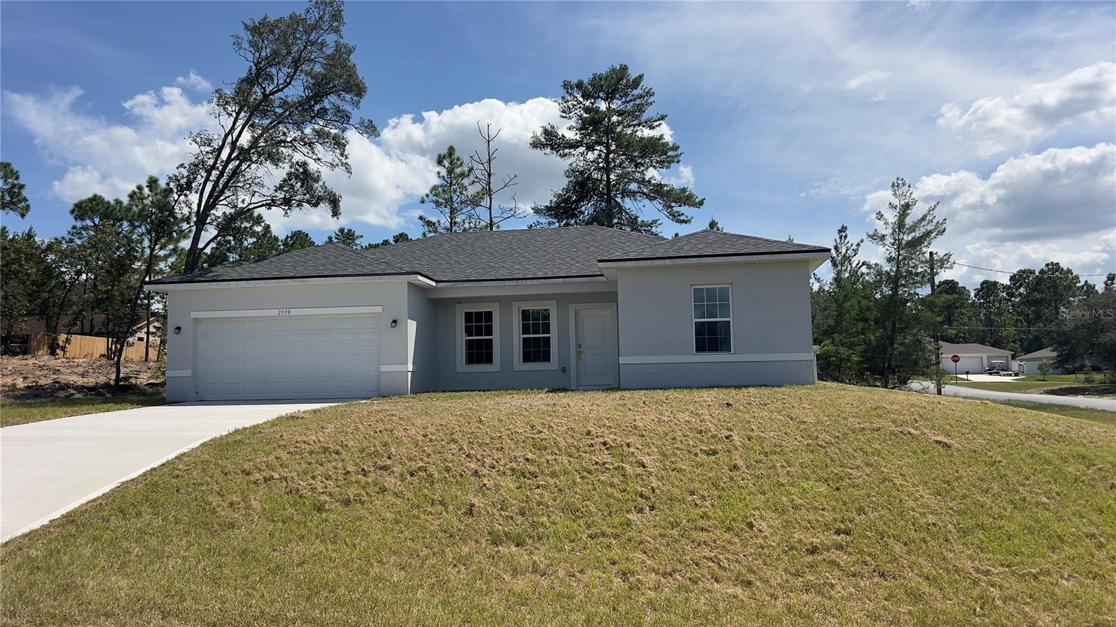 Spacious 4-bedroom, 2-bath home with a 2-car garage. Bright open floor plan, modern kitchen, and plenty of storage. Quiet neighborhood in Citrus Springs.