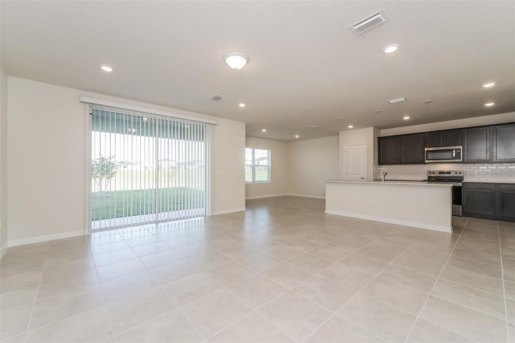 Photo of 3735 Haddon Avenue, Davenport, FL 33837 (MLS # O6395380)