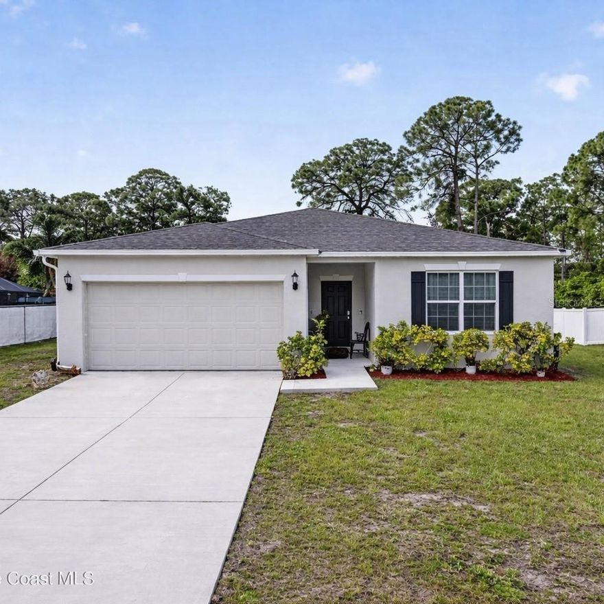Step into this like-new 2021 concrete-block home featuring 4 bedrooms, 2 baths, and 1,893 sq ft of beautifully designed living space. The desirable split floor plan offers privacy and functionality, while the open layout centers around a spacious kitchen island and stone countertops, creating the perfect hub for family gatherings and entertaining. Enjoy the elegance of a formal dining room, ideal for hosting holidays and special occasions. The primary suite delivers comfort with a large walk-in closet, double vanity, and a sleek walk-in shower. Convenience continues with indoor laundry, modern finishes throughout, and a truly turnkey presentation. Situated on a nice lot with an open back porch, this home offers a peaceful outdoor space for morning coffee or evening relaxation.

Centrally located near schools, shopping, and just minutes from I-95, this home blends comfort, style, and accessibility in one exceptional package.