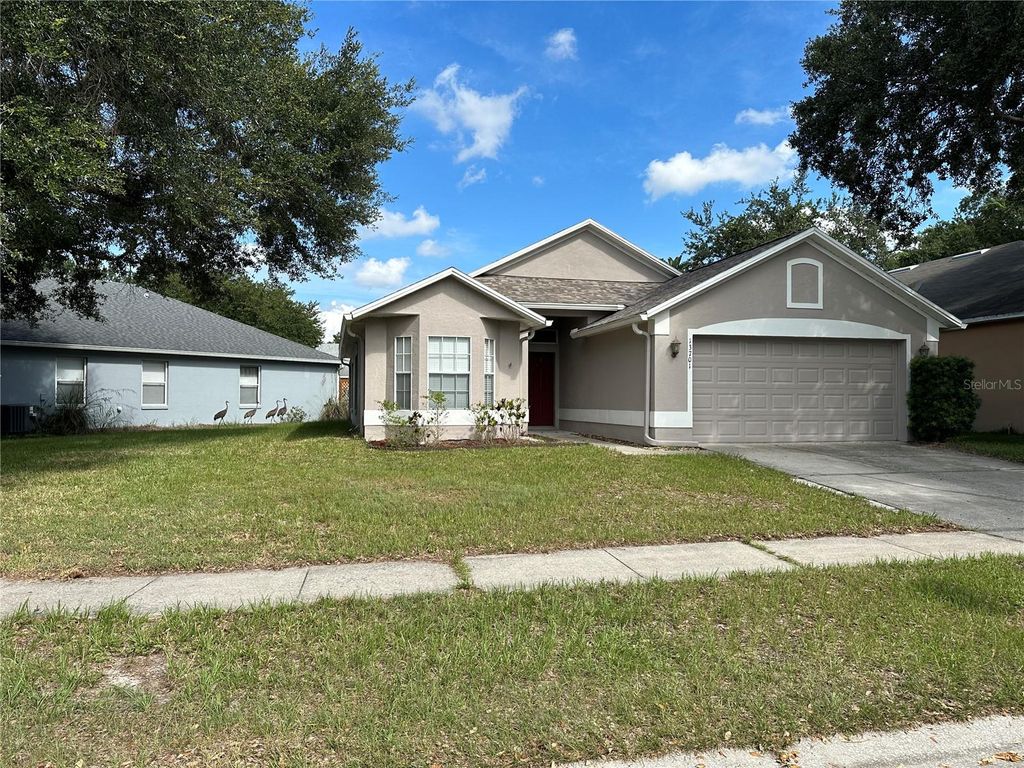 Photo of 13701 Meadowpark Avenue, Orlando, FL 32826 (MLS # O6404124)