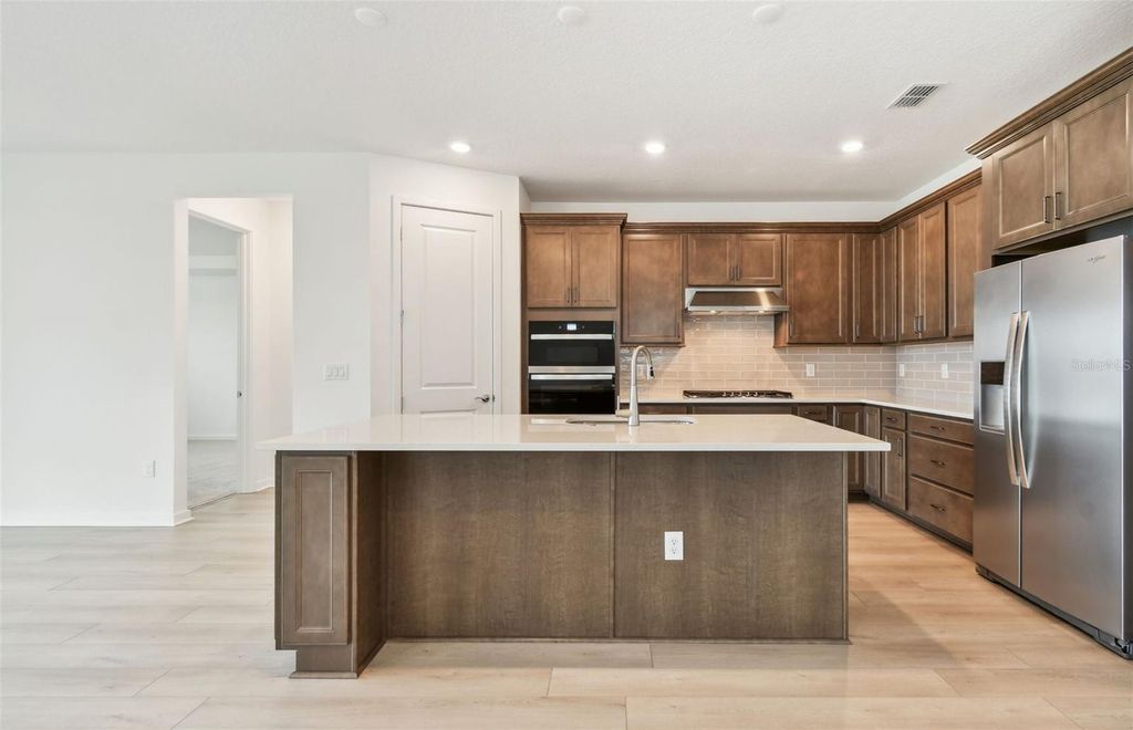 Photo of 10317 Cross River Trail, Parrish, FL 34219 (MLS # TB8372460)