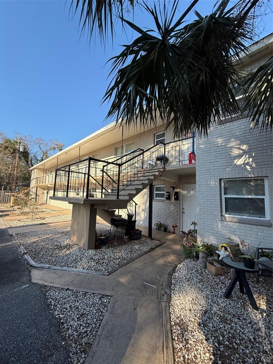 Location, location, location! This Large 2-bedroom, 2-bath 1st floor unit is ideally situated directly across the street from scenic Riverwalk Park in Port Orange, offering the best of Florida living. Enjoy daily access to the park’s kayak/canoe launch, fishing piers, playground, splash pad, picnic areas, and walking trail—just steps from your front door. Inside, the spacious layout offers ample room to relax and entertain, with tile flooring throughout, ceiling fans, and central air. The well-equipped kitchen features granite countertops, stainless steel appliances, a dishwasher, and a microwave. A washer and dryer hookup is located in the unit, with appliances available upon request. This quiet, low-density building offers surface parking and a peaceful residential setting, all while being just minutes from Halifax River, the beach, shopping, dining, and commuter routes. Perfect for professionals, couples, or small families looking to enjoy a vibrant coastal lifestyle—schedule your showing today!