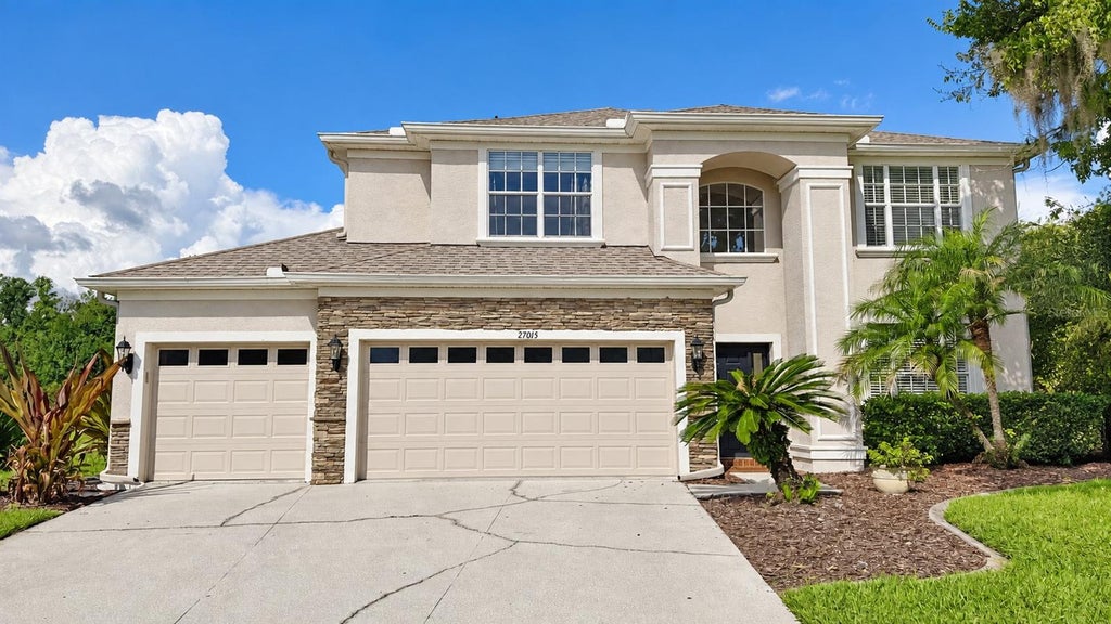 Photo of 27015 Firebush Drive, Wesley Chapel, FL 33544 (MLS # TB8548192)