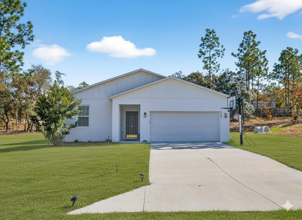 Photo of 8565 SW 125th Court Road, Dunnellon, FL 34432 (MLS # O6354084)