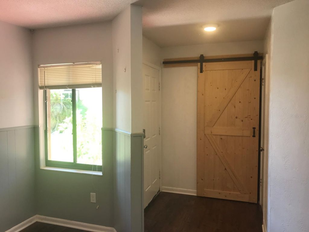 Photo of 112 Oakwood Village Circle, Daytona Beach, FL 32119 (MLS # S5143588)