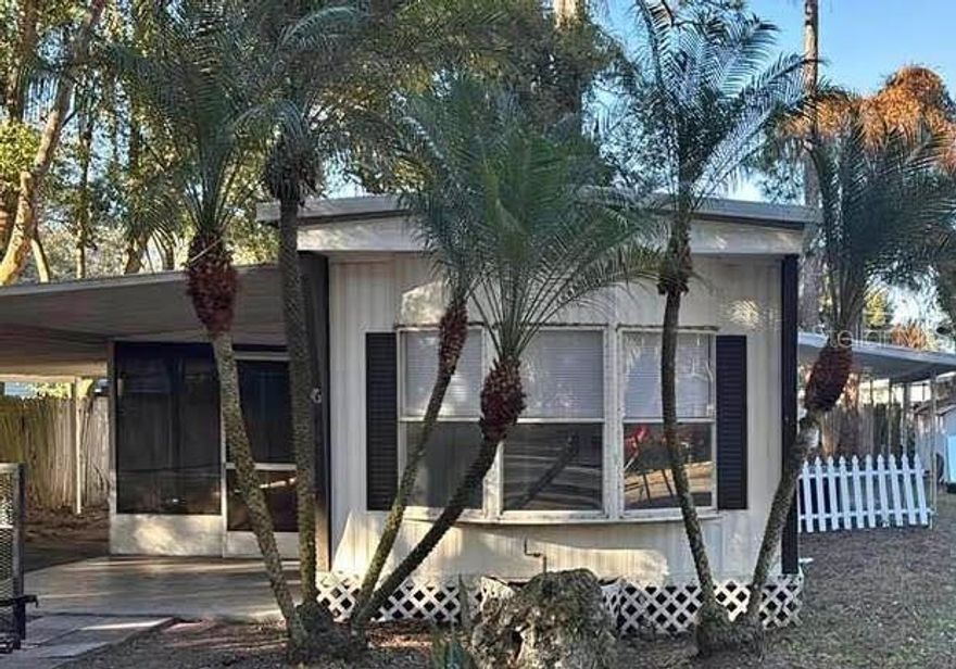 INVESTORS: NO HOA / NO LOT FEES. Clean 2/1 in Lake Alfred ready for your next project or rental. Features a durable metal roof, luxury vinyl floors, and a private carport. Owner financing is on the table! Excellent location near Lake Mariana boat ramps—perfect for attracting long-term tenants or vacationing anglers. No lease restrictions provide maximum flexibility for your investment strategy. Property has rented for $1200 monthly in the past. Act fast on this low-carry-cost opportunity in a prime central Florida location.  All sizes are approximate to be verified by buyer.  Contact today for details.