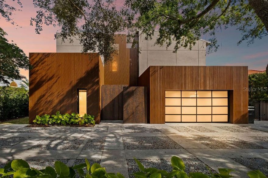 A New Standard of Modern Sophistication in Winter Park
In a city known for its heritage, this ground-up architectural renovation emerges as a bold statement of modern luxury. Located within one of Winter Park’s most coveted enclaves, this four-bedroom, five-bathroom residence is not merely a place to live, but a meticulously crafted experience where high-design meets intuitive living.
Step through the striking 10-foot glass pivot doors into a world defined by light and scale. The soaring foyer gives way to an expansive open-concept floor plan, where the boundary between indoors and out begins to blur. Sleek Italian wood flooring guides you through the main level to the heart of the home: a grand living area anchored by a statement fireplace. It is a space designed for the quiet morning coffee just as much as the vibrant evening gala.
A Symphony of Intelligence. This home lives and breathes with you. Equipped with a fully integrated Control4 automation system, the environment responds to your touch. From your device, you can orchestrate the perfect atmosphere—adjusting custom lighting scenes, streaming high-fidelity music, or setting the climate before you even arrive. This "invisible concierge" extends to the water’s edge, allowing you to manage pool temperatures and lighting with effortless precision.
The kitchen is a masterclass in culinary elegance, blending European minimalism with professional-grade power. Light-toned cabinetry hides clever storage solutions, while premium Sub-Zero and Wolf appliances sit beneath striking Neolith double countertops. It is a space that invites creativity, whether you are hosting an intimate chef-led dinner or enjoying a slow Sunday brunch.
The commitment to "pride of ownership" is felt most deeply in the private quarters. Each of the four bedrooms is a dedicated en suite retreat, featuring voluminous walk-in closets and spa-inspired baths. Custom vanities, Neolith surfaces, and soft, indirect lighting create a hotel-level sense of calm, ensuring every guest or family member feels a sense of total seclusion.
The Backyard Resort. The transition to the outdoors is seamless, revealing a private oasis designed for the quintessential Florida lifestyle. A Brazilian IPE wood deck surrounds a shimmering, heated mini-pebble pool in French gray. Beyond the water, the lushly landscaped grounds lead to a premier summer kitchen clad in sintered stone. Here, under the Florida stars, the integrated grill and sink provide the ultimate setting for al-fresco entertaining.
Experience the pinnacle of Winter Park living. You are situated just moments from the refined energy of Park Avenue, the prestigious Interlachen Country Club, and the scenic beauty of Phelps Park. With zoning for the area’s top-rated schools the location is as strategic as it is beautiful.
Notable Refinements:
• Whole-home generator ensuring absolute peace of mind.
• Finished garage floors and a circular driveway accented with salt and pepper gravel.
• Full-home Control4 integration for music, light, and climate.
Experience the art of living well—connect with us today for an exclusive private tour
**Unique financial opportunities available: The seller is open to owner financing and Bitcoin (Digital Asset/ Crypto) as a medium of exchange. Please reach out to discuss how we can facilitate a transaction tailored to your needs.**