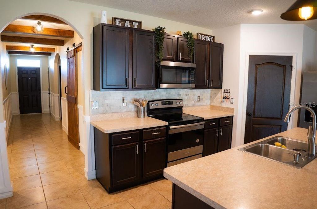 Photo of 1315 Fox Squirrel Drive, Davenport, FL 33897 (MLS # S5148920)