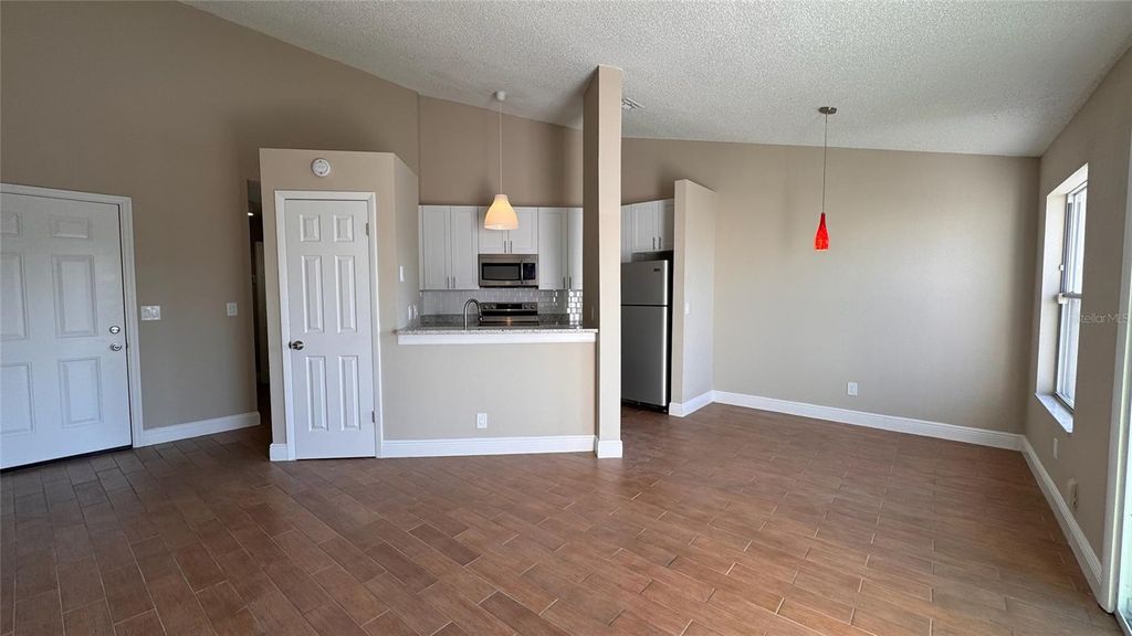 Photo of 2532 Woodgate Boulevard #202, Orlando, FL 32822 (MLS # O6389144)