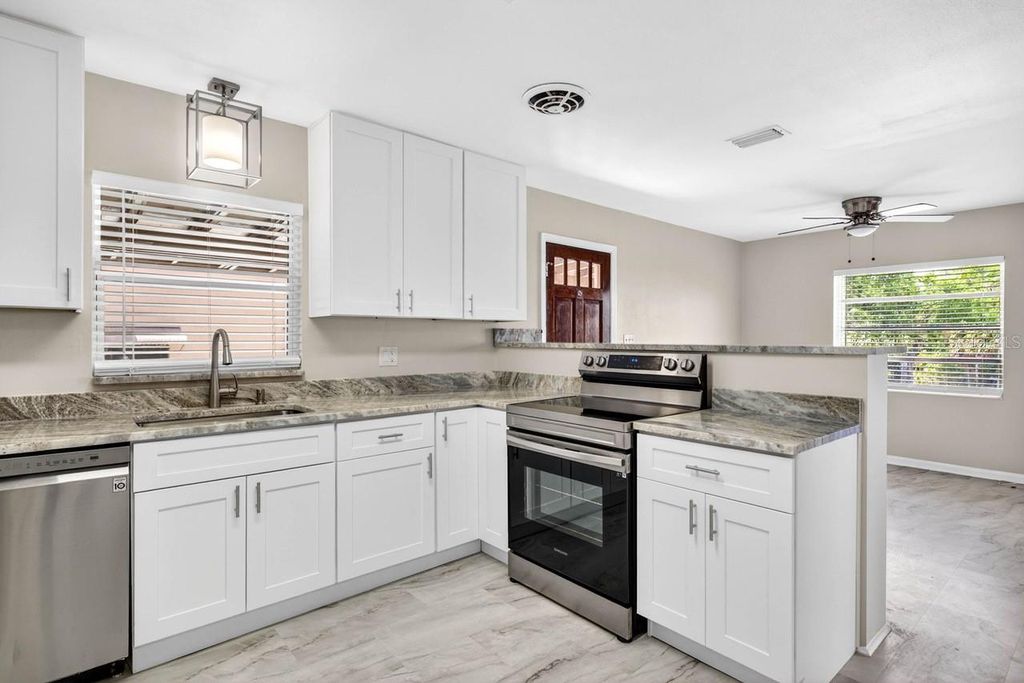 Photo of 1310 W Woodlawn Avenue, Tampa, FL 33603 (MLS # TB8503397)