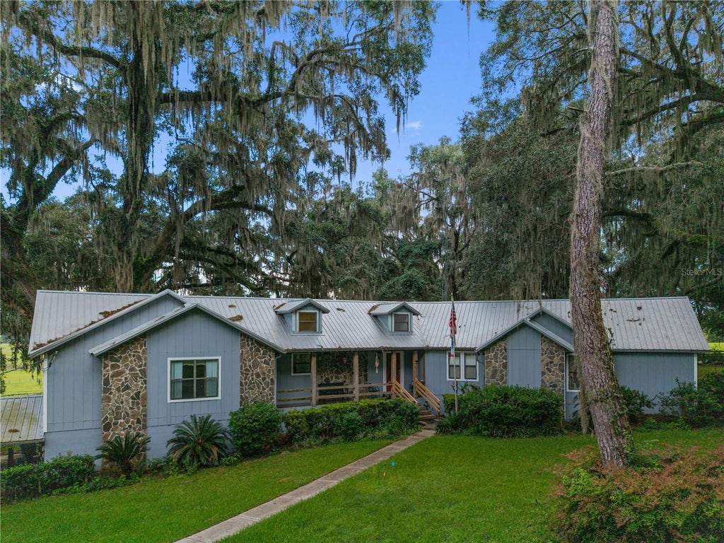 Photo of 22118 Old Providence Road, Alachua, FL 32615 (MLS # GC543258)