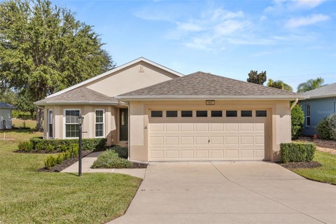 Photo of 4991 Portsmouth Street, Tavares, FL 32778 (MLS # O6454036)