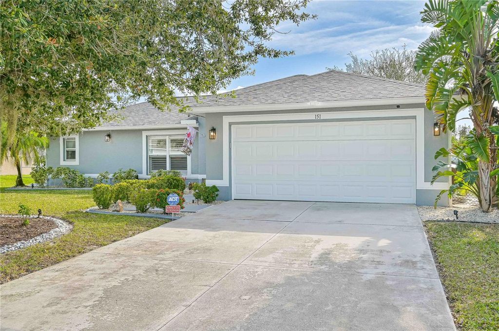 Photo of 151 Ocean Park Drive, Lehigh Acres, FL 33972 (MLS # A4676875)