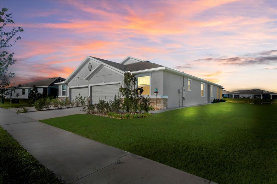 Want NEW CONSTRUCTION, but don't want to wait! This is the perfect place to experience a quiet and quaint neighborhood tucked away in WESLEY CHAPEL, yet close proximity to major HIGHWAYS like I-75, I-4, and SR 52, 54, and 56 to reach other major cities surrounding! Discover the epitome of Florida living in this stunning Siesta model VILLA located in the Towns at Woodsdale! This exquisite 3-bedroom, 2-bathroom, 2-car garage home boasts 1,565 square feet of beautifully designed space, perfect for both relaxation and entertaining. One of the bedrooms can easily be converted to an OFFICE/FLEX SPACE boasting the FRENCH GLASS DOORS, but still be considered a room with a closet. You'll be captivated by breathtaking water views that provide a picturesque backdrop to your daily living. Step inside to find a light-filled open floor plan that seamlessly blends comfort and style. The modern kitchen is a chef's delight, featuring sleek appliances that all convey and ample counter space on your MASSIVE KITCHEN ISLAND. Retreat to the spacious primary suite, complete with a luxurious en-suite bathroom with WALK-IN SHOWER, ensuring your personal sanctuary for unwinding after a long day. Outside, enjoy your EXPANSIVE COVERED and SCREENED LANAI that is great for gatherings and entertaining your guests. The community's sparkling pool and inviting cabana are perfect for soaking up the sun or hosting weekend get-togethers. Have an electric vehicle? This home provides an EV CHARGER installed for your convenience. The mailbox hub adds a convenient touch to your new lifestyle! This home is located just moments from top-rated schools, beloved local restaurants, and exciting attractions near Pasco County and surrounding, Outlet Malls, Fairgrounds, U-PICK Farms, LAGOON COMMUNITIES open to the Public, and so much more. As a newer construction, this home has been lovingly lived in for less than a year, ensuring a fresh, modern atmosphere throughout. Don’t miss this chance to make this beautiful home yours—schedule a tour today and experience this vibrant community in one of the most beloved towns in Florida. Your dream lifestyle awaits! Set your appointment today and don’t miss this opportunity to have a like new construction home without the wait.