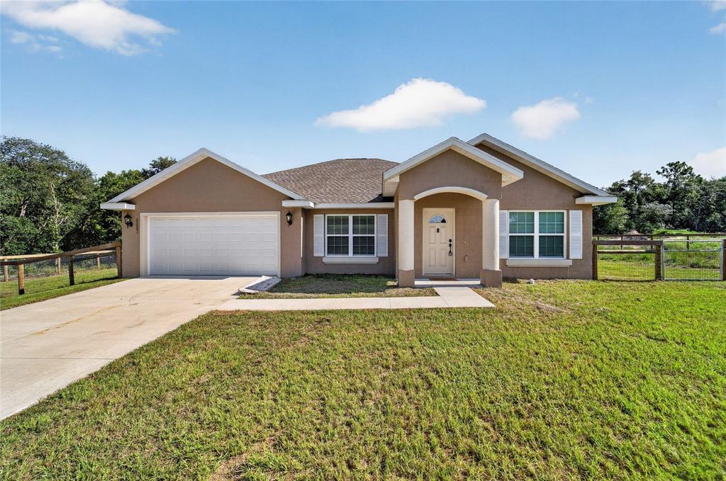 Photo of 22081 SW Pine Bluffs Road, Dunnellon, FL 34431 (MLS # OM728776)