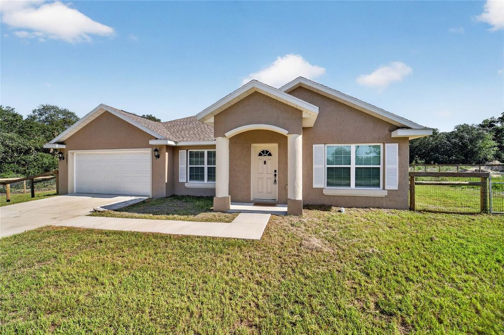 Photo of 22081 SW Pine Bluffs Road, Dunnellon, FL 34431 (MLS # OM728776)