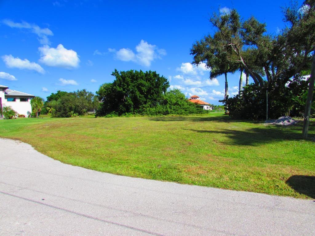 Opportunity to secure a ready-to-build homesite in the growing Punta Gorda area. This oversized parcel offers both space and privacy while remaining close to shopping, dining, medical facilities, and quick access to I-75. Full set of building plans for a single-family residence has already been reviewed and approved by the county, saving valuable time and expense for the buyer. Seller is a licensed builder and can construct the approved home or work with the buyer to customize. Utilities available nearby. A great option for buyers looking to fast-track their new Florida home or for investors seeking a parcel with strong future potential.