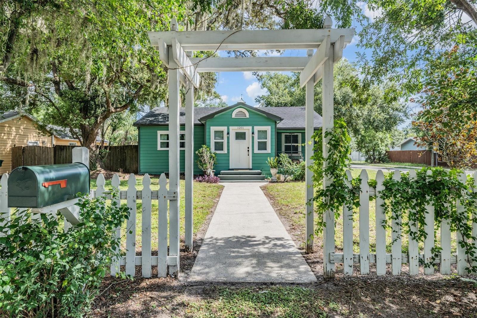 Welcome to this beautifully updated bungalow nestled on a spacious corner lot in the heart of Seminole Heights' coveted Hampton Terrace neighborhood. With timeless curb appeal and thoughtful modern upgrades, this home offers the perfect blend of character and convenience.
Inside, you'll appreciate the exceptionally efficient use of space where every square foot is maximized for comfort and flow, the high ceilings, original shiny hardwood floors and modern kitchen and bath. Step onto the inviting front porch, rebuilt in 2018 with durable composite decking and enjoy both front and side yard views. Inside is natural light-filled living space. The updated kitchen has contemporary style and functionality, featuring sleek stainless steel appliances (2021), stone countertops, eat-in area and tasteful finishes that complement the home's original period bungalow charm.
These systems have been meticulously maintained and upgraded:
New roof (2016) with solar attic fan for energy efficiency,
Electric panel replaced (2018),
HVAC system replaced (2021) for year-round comfort,
Windows and front door replaced (2024) and are storm impact graded.
Enjoy outdoor living on the newly added concrete patios and pergola (2023)—perfect for entertaining or relaxing in your private oasis. Off-street parking driveway.
Whether you're drawn to the historic character of Seminole Heights or the vibrant community lifestyle, this home is a rare find that checks the boxes. Enjoy nearby restaurants, grocery and local amenities that make this Seminole Heights the hot spot it is. Beautiful Lake Roberta is just a short walk away. Outside shed storage. Laundry room in one-time garage that is now used for storage. Five minute drive to downtown Tampa, 20 minute drive to Tampa International Airport.
Make your private showing appointment today.