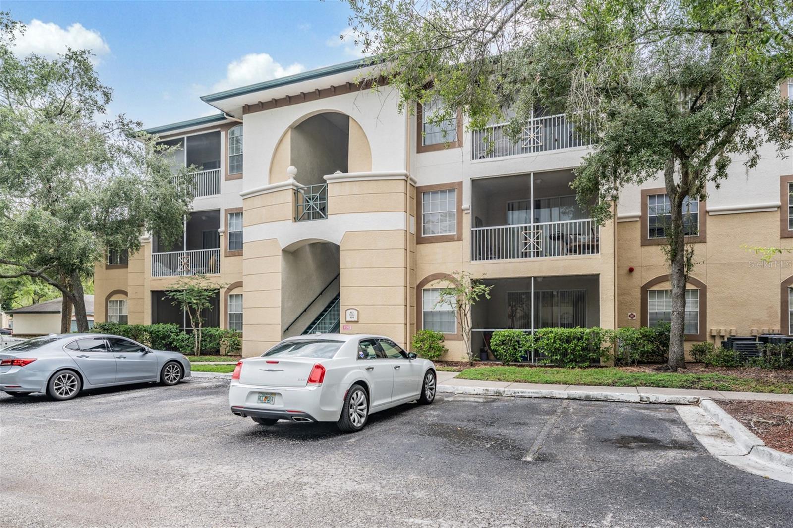 One or more photo(s) has been virtually staged. Welcome to Jade at Tampa Palms! This rare ground-floor, corner 3BR/2BA condo offers a desirable split floor plan and 1,336 sq. ft. of comfortable living. The open-concept living and dining area boasts high ceilings and flows seamlessly into a well-appointed kitchen with stone countertops and all appliances included. An inside laundry room adds everyday convenience.
The private primary suite features a walk-in closet and ensuite bath, while two additional bedrooms share a second full bath—perfect for guests, a home office, or hobbies.
Residents enjoy resort-style amenities, including a clubhouse, pool, tennis courts, and playground. Monthly HOA fees cover water, sewer, trash, exterior maintenance, pest control, pool upkeep, and security—plus, there’s no CDD and you’re in Flood Zone X for added peace of mind.
Ideally located just minutes from I-75, shopping, parks, and major medical centers, this home is also a short drive to the University of South Florida (USF)—one of Florida’s top public universities and a major hub for education, research, and healthcare employment. This is New Tampa living at its most convenient.