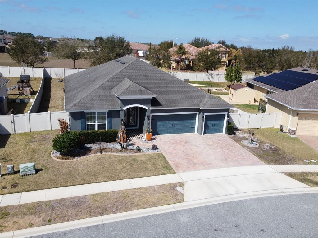Photo of 715 Calabria Way, Howey In The Hills, FL 34737 (MLS # O6386753)
