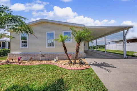 Photo of 37200 Neukom Avenue, Zephyrhills, FL 33541 (MLS # TB8520741)