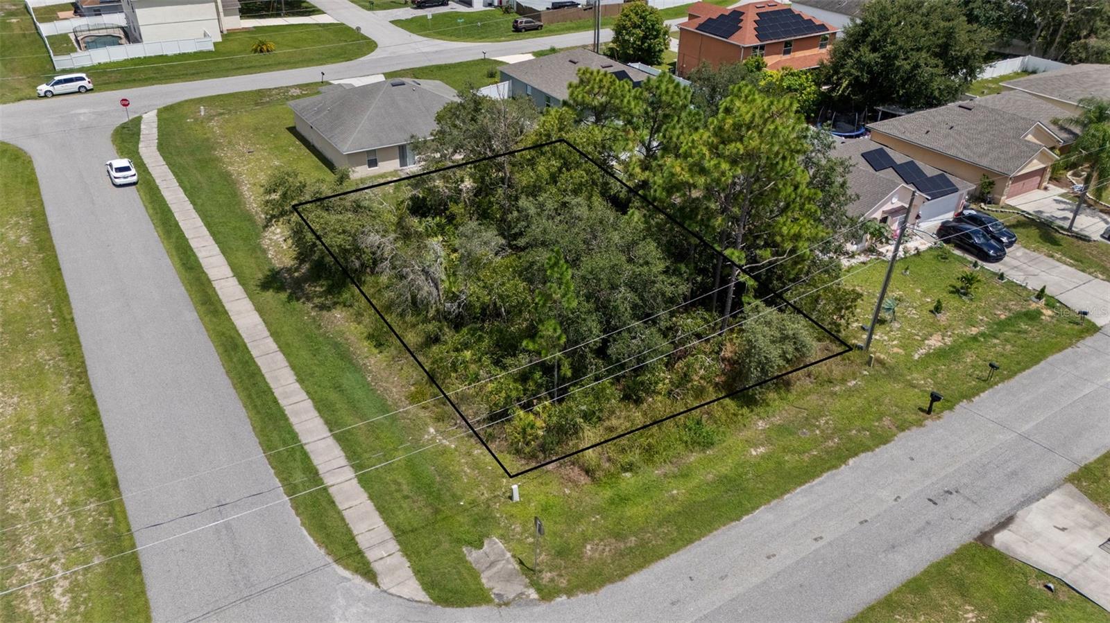 The seller owns 12 lots in Poinciana, several on the same street, which can be PURCHASED IN BULK, presenting a rare opportunity for builders or investors to secure multiple parcels at once at a discounted rate. MLS Numbers: O6335500, O6335683, O6335685, O6335689, O6335698, O6335703, O6335716, O6335719, O6335719, O6335726, O6335755. This corner lot at 1801 Hudson Ct is in an ideal location and is ready for your next project. The low HOA fee includes access to the Poinciana Victory Pool, Aquatic Center with 8 lap lanes, and the APV Community Center featuring event rooms, an amphitheater, a fitness center, and expansive outdoor recreation with sports fields, basketball courts, playgrounds, picnic areas, and walking trails. High-speed internet (300 Mbps) and cable TV (250+ channels) are also included. The lot is conveniently located near shopping centers and restaurants. It’s a short drive to Disney, SeaWorld, Universal Studios, Legoland, and Orlando International Airport, offering both lifestyle and convenience. This lot is perfect for new construction or long-term investment. With low HOA fees, abundant amenities, and strong area growth, these Poinciana lots provide unmatched opportunity for builders, investors, or future homeowners.