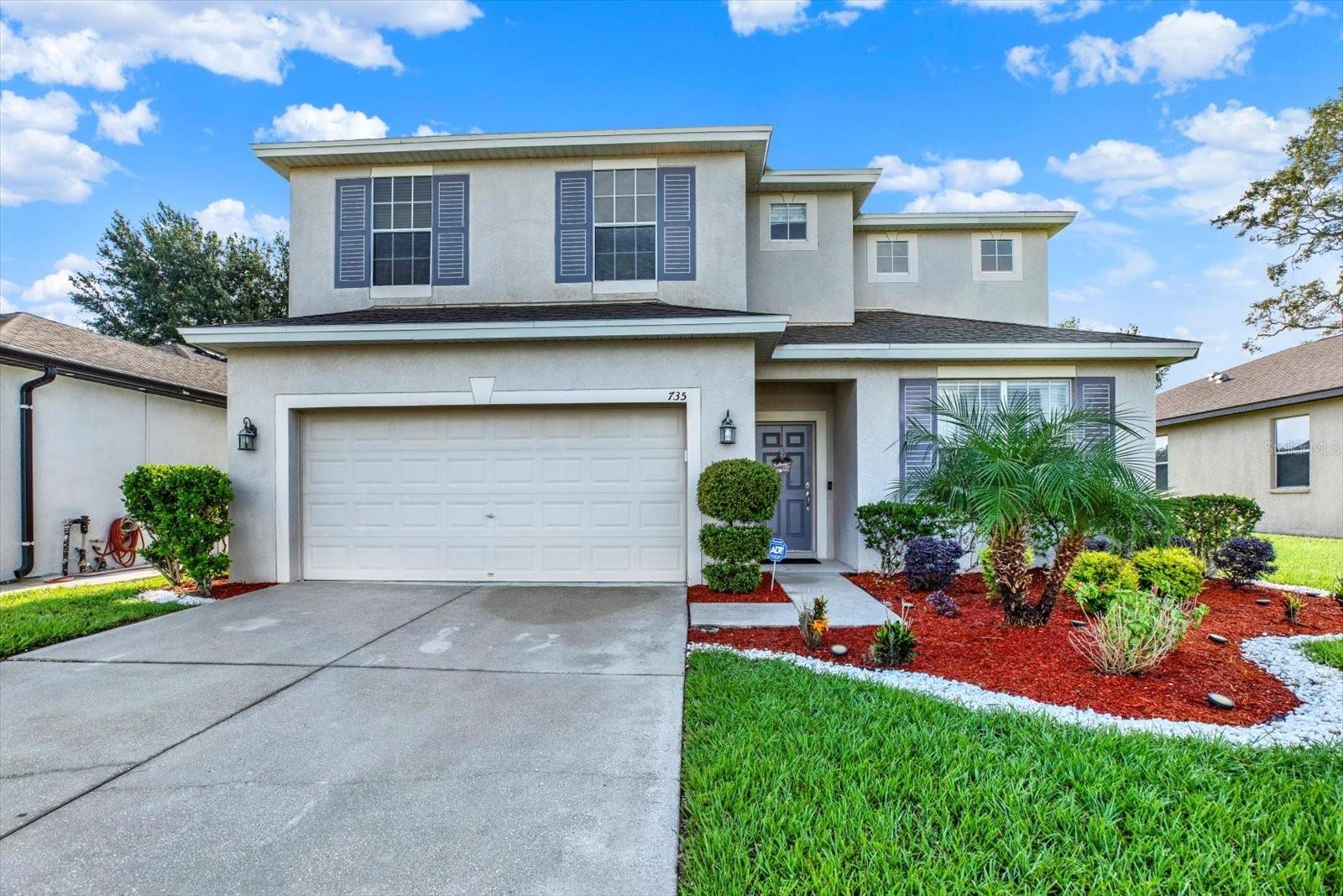 Welcome to this beautifully maintained 3-bedroom, 2.5-bath home offering 2,318 sq. ft. of comfortable living in the desirable Villages of Avalon. From the moment you arrive, you’ll notice the pristine curb appeal and fresh landscaping. Inside, the spacious open-concept layout features a light-filled living area, with new vinyl flooring in 2021, a well-appointed kitchen with a center island, and a dining area perfect for gatherings. The separate formal dining room adds elegance and flexibility for entertaining. Off the dining room there is a generous closet for extra storage. A half Bath and inside utility room for added convenience. Upstairs, the generous primary suite offers a walk-in closet and private en-suite bath, while the two secondary bedrooms also feature their own walk-in closets for ample storage. New carpet in 2021. The versatile loft provides additional space for a home office, playroom, media area, or even an additional bedroom. The home’s AC system was replaced in 2020, offering peace of mind and energy efficiency. Step outside to enjoy a screened-in patio overlooking the fully fenced backyard, ideal for pets, play, or relaxing with serene views of the expansive open area behind the home. Located just minutes from shopping, dining, and the Veterans Expressway, this home offers easy access to Tampa and surrounding areas. Community amenities include a sparkling pool, clubhouse, and scenic walking trails. Clean, well-maintained, and move-in ready — this home is a must-see!