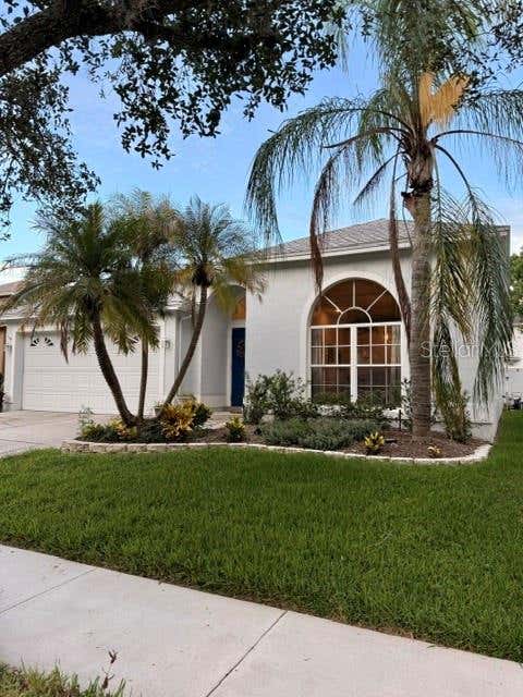 Photo of 13620 Waterhouse Way, Orlando, FL 32828 (MLS # O6431249)