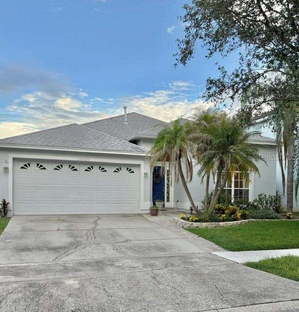 Photo of 13620 Waterhouse Way, Orlando, FL 32828 (MLS # O6431249)