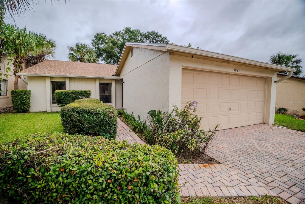 Photo of 3947 Cypress Landing W, Winter Haven, FL 33884 (MLS # TB8559476)