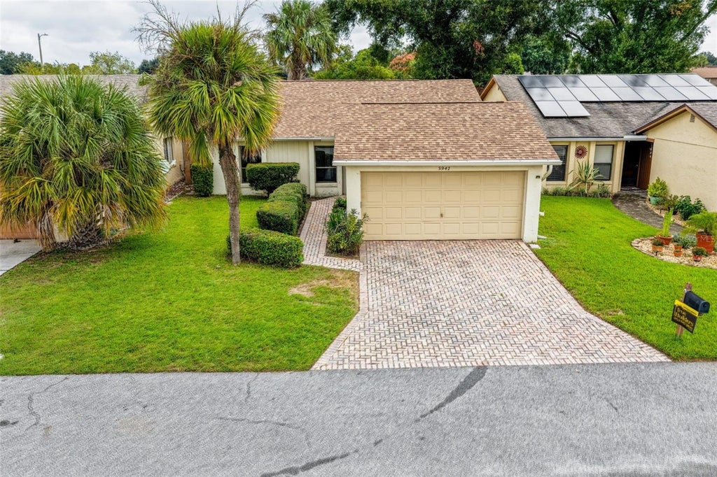 Photo of 3947 Cypress Landing W, Winter Haven, FL 33884 (MLS # TB8559476)