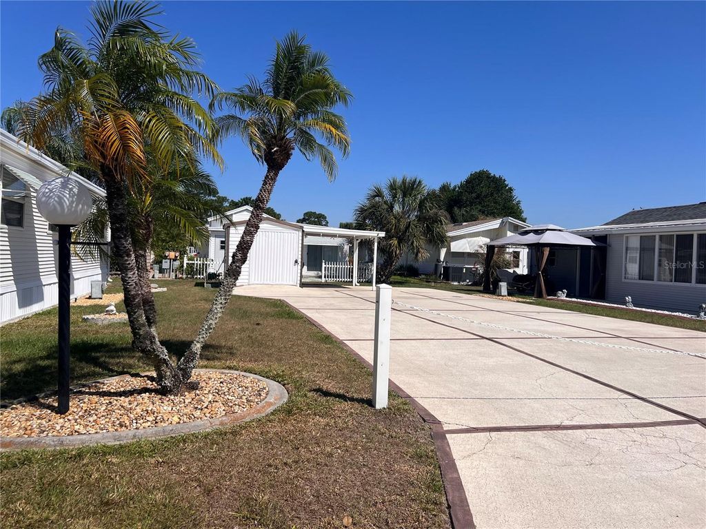 Photo of 204 Big Pine Avenue S, Frostproof, FL 33843 (MLS # K4903317)