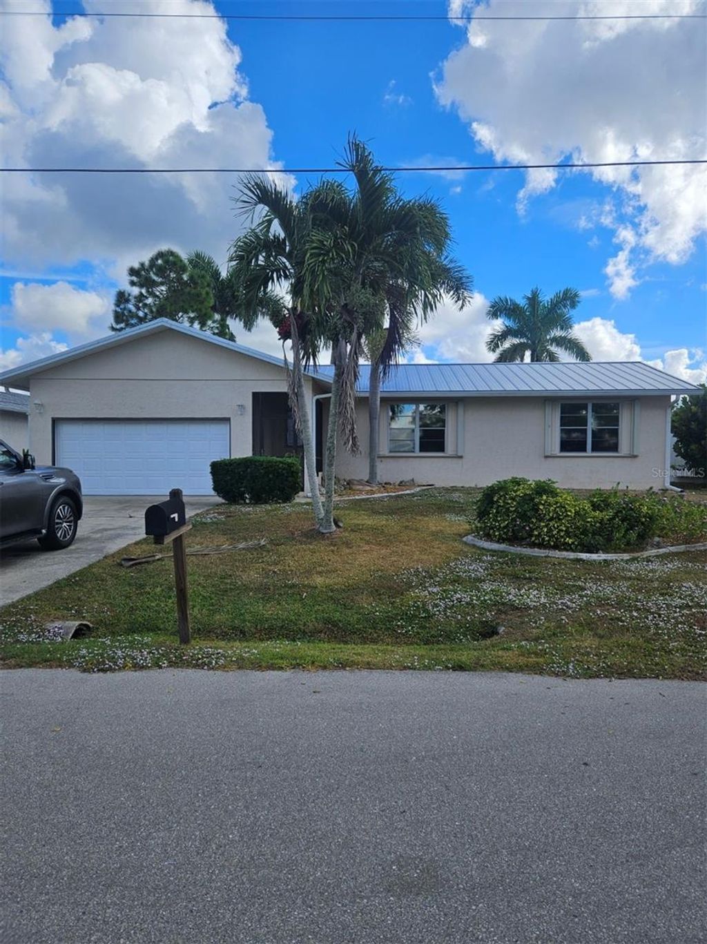 Photo of 4420 Palm Drive, Punta Gorda, FL 33950 (MLS # D6146127)
