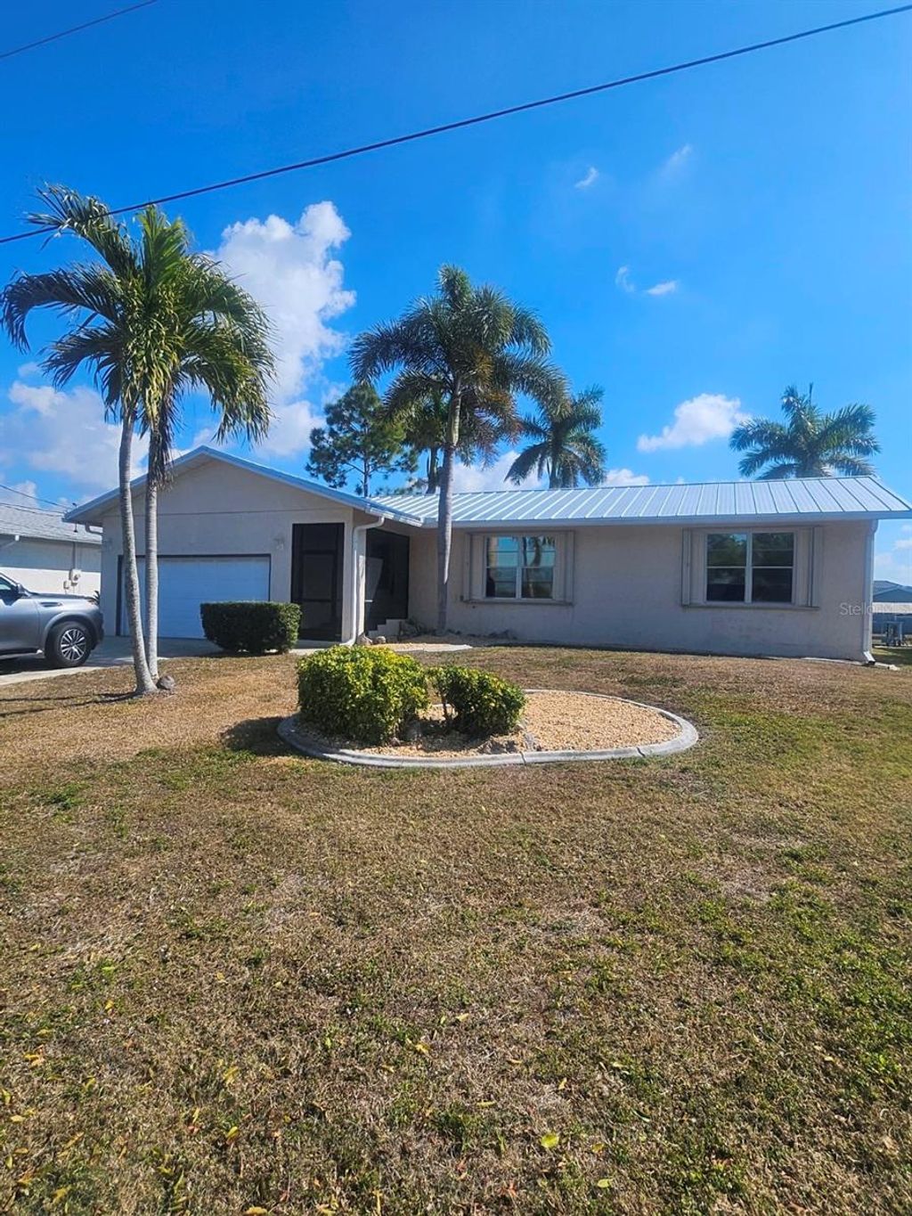 Photo of 4420 Palm Drive, Punta Gorda, FL 33950 (MLS # D6146127)