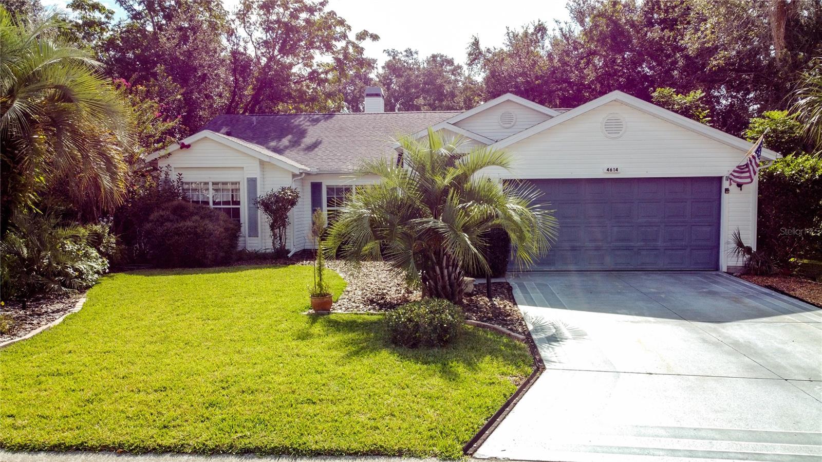 Welcome to 4614 River Ridge Dr in The Plantation at Leesburg
This lovely home is tucked into one of Central Florida’s friendliest 55+ communities, where neighbors wave hello and life moves at just the right pace.
Inside, you’ll find 2 comfortable bedrooms and 2 baths, along with a bright, open living area that’s great for both quiet mornings and casual gatherings The living room features a wood burning fireplace which is flanked by 2 single French doors that lead out to the Florida room. Off the living room is a nice sized bonus room/library with double French doors. Beautiful, engineered hardwood floors span the living room, dining room, bonus room/library and hallways. The kitchen has plenty of space for cooking and storage and a cozy breakfast nook that’s just right for coffee and conversation. The primary suite offers 2 walk in closets and private bath with double vanities. The split floor plan provides a spacious guest bedroom that offers privacy and makes friends and family feel right at home.
Step out to the enclosed lanai and enjoy the Florida breeze, overlooking the golf course. It’s a perfect spot to unwind at the end of the day. The house also features a 2 car garage.
Life at The Plantation at Leesburg is all about enjoying your days. From golf and swimming to clubs and community events, there’s always something to do—or not do, if you prefer a quiet day at home.
Plantation also features a restaurant and pro shop on premises, as well as 3 club houses, 3 pools, 2 fitness centers, (2) 18-hole golf courses, a driving range, archery range, woodworking shop, tennis, pickleball, softball and so much more.
4614 River Ridge Dr isn’t just a house: it’s a place to feel at home. Come see it for yourself and imagine the lifestyle waiting for you here.
_Roof 2018, A/C 2024_______________________________________