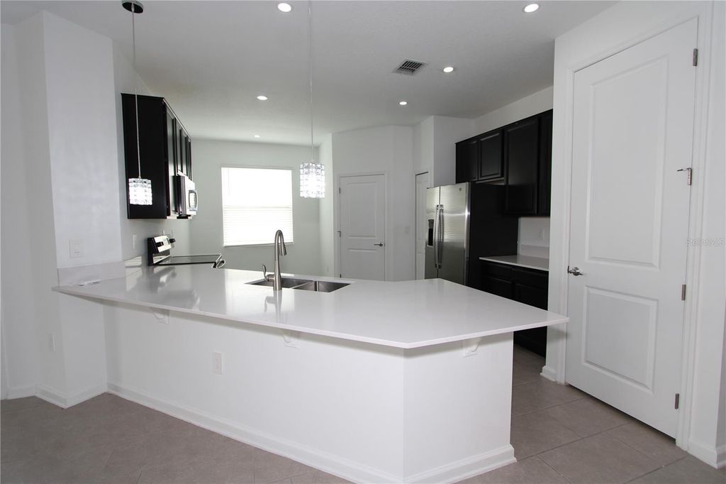 Photo of 737 Citrus Reserve Boulevard, Davenport, FL 33837 (MLS # O6406317)