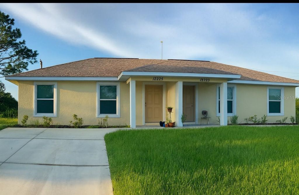 Photo of 12223 Zittle Avenue, Port Charlotte, FL 33981 (MLS # D6144955)