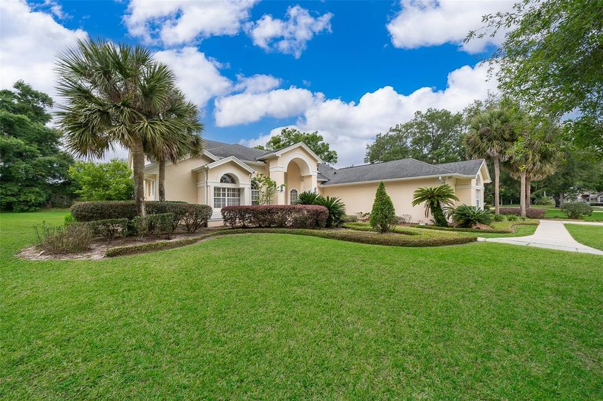 Expansive one-level executive home of 4200+ sf nestled on an unbelievable 1+ ACRES in highly desirable Markham Meadows; MINIMAL HOA FEE of only $750/yr!! This beautiful home offers an ideal blend of comfort and style. Boasting 4 spacious bedrooms (incl second master suite or in-law suite) and 5 full baths, this residence provides ample room for both relaxation and entertainment.  A separate office with built-ins offers the perfect environment for working from home or pursuing personal projects. The Primary master suite is privately situated to itself and showcases a sitting area overlooking the pool, a large walk-in closet, and an ensuite bath complete with an oversized hydro-massage bath and separate shower stall. The sparkling screened-in pool/spa with travertine deck, waterfall, and covered lanai is ideal for enjoying the ultimate Florida lifestyle. The property provides plenty of outdoor space to enjoy, with room for gardening, outdoor activities, or simply unwinding in the serene setting. The home's location is ideal for those seeking both privacy and proximity to essential amenities such as great schools, world-class attractions, shopping, dining, and business districts. With its mix of functionality and charm, this property offers an exceptional living experience. It should be noted that the listing price reflects that the owner had a sinkhole insurance claim in 2009 that was successfully resolved.