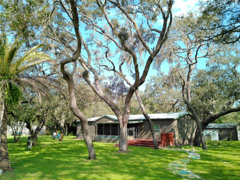 Photo of 11113 Black Walnut Street, Hudson, FL 34669 (MLS # TB8423007)