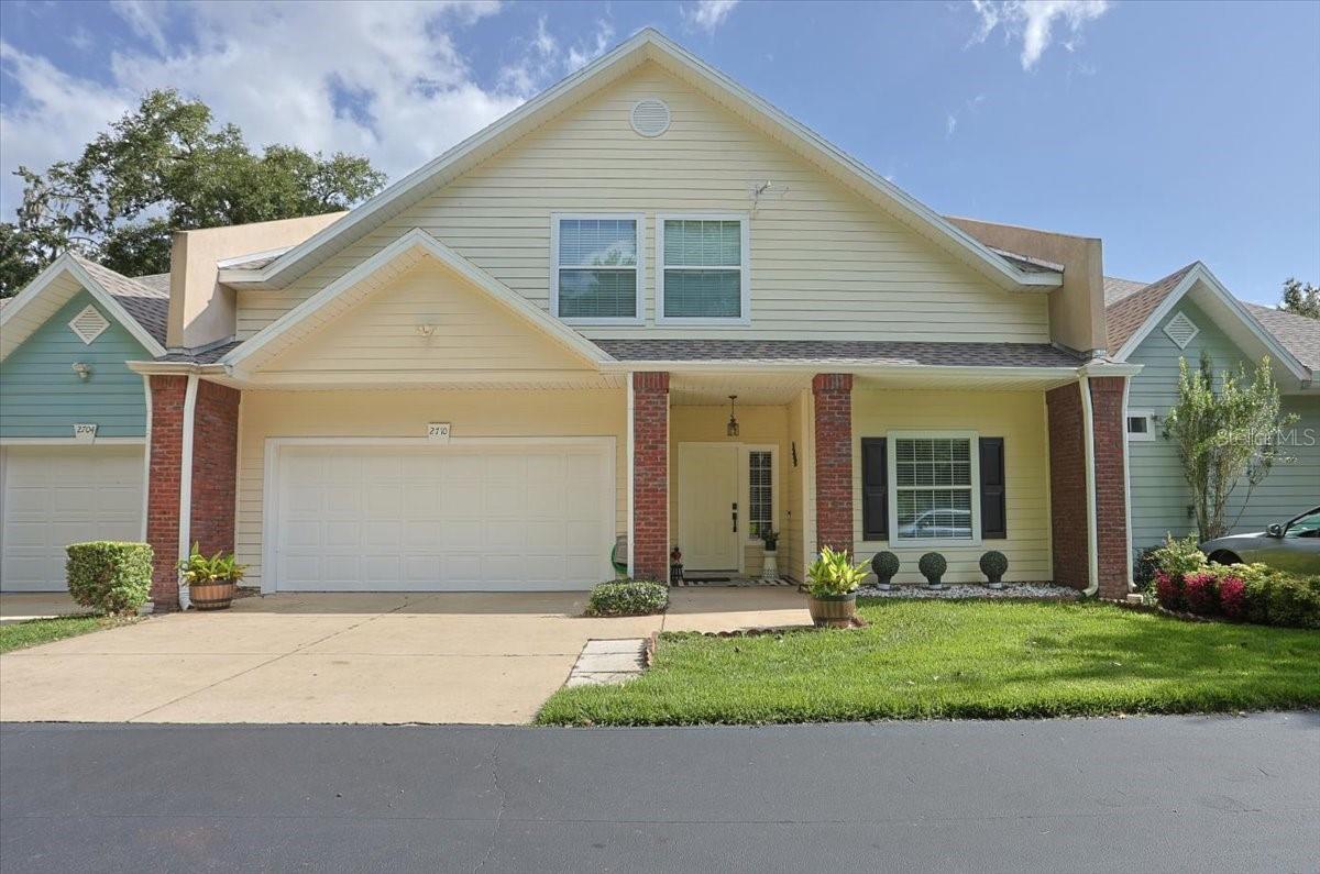 Largest single family attached home on the market. This 5 bedroom/3 bathroom two-story home is situated on a double lot in Williamsburg at Meadowbrook. Enjoy living in a small well-maintained gated community centrally located with easy access to I-75 on 39th Avenue or minutes from Newberry Road. This is NOT A CONDO. This home is over 3500 square feet with two primary bedroom suites. There are two bedrooms on first floor and three bedrooms on second floor. Tile and luxury vinyl throughout home--no carpet.
The spacious open -concept kitchen offers ample counter space, breakfast bar, and a dedicated mini bar that will make your next dinner party a breeze. Kitchen was recently updated to include quartz countertops The stone tile connects the kitchen to the grand living room, showcasing the 20-ft ceiling with skylights and beautiful views of the golf course. Three French doors lead to the screened-in lanai, accenting the feeling of openness and space. Enjoy grilling on your gas grill with built-in grill ventilation system.
The master bedroom offers a quiet retreat that includes a large master bath with separate tiled shower and Jacuzzi bathtub. On the second floor, there is attic space that provides plenty of extra storage for your seasonal items.
The views of the golf course/conservation area are stunning. Amazing natural light in all rooms of the home.
The gated Meadowbrook Golf Community includes amenities such as a gym, community pool, tennis and basketball courts, library, sauna, and clubhouse. Located near I-75, Santa Fe College, and close to A-rated schools.