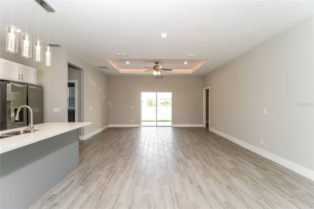 Photo of 137 Zinnia Lane W, Kissimmee, FL 34759 (MLS # TB8478112)