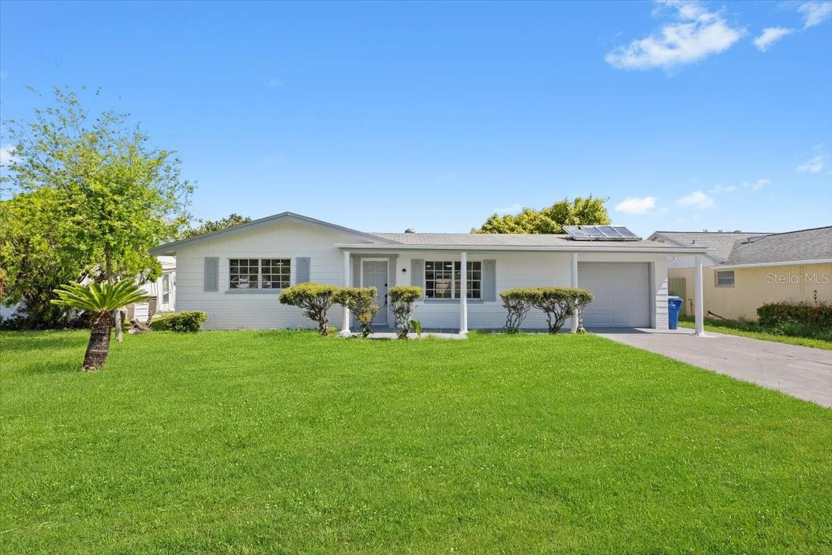 One or more photo(s) has been virtually staged. Welcome to this beautifully remodeled 2-bedroom, 2-bath home with an attached garage, located in the heart of Holiday, FL! Every inch of this home has been thoughtfully updated, featuring a stylish kitchen with modern finishes, refreshed bathrooms, new flooring, and a bright open layout perfect for entertaining or relaxing. Nestled in a well-established area just minutes from the Gulf of Mexico, Anclote River Park, and stunning beaches, this home offers easy access to local shops, dining, and major highways for a quick commute to Tampa or Clearwater. Whether you're looking for your first home, a seasonal retreat, or a low-maintenance property to enjoy year round, this move in ready gem has it all, don’t miss your chance to make it yours!