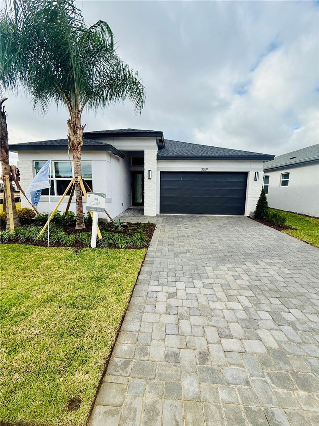 Photo of 3559 Malta Avenue, Wesley Chapel, FL 33543 (MLS # TB8453215)