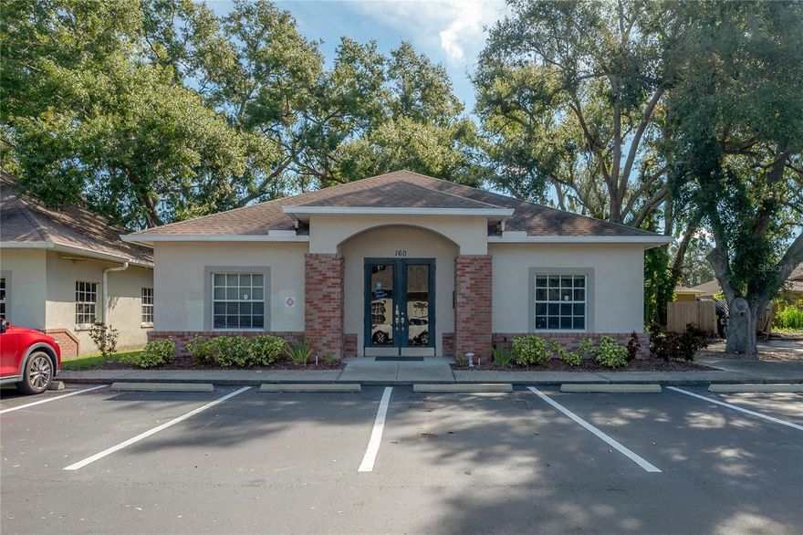 Freestanding, move-in ready office building with ample parking.  Sign frontage directly on the large thoroughfare of Bloomingdale Avenue.  This quiet, well-maintained office park offers a serene setting for your business to thrive, with easy access to the surrounding areas of Brandon, Riverview, and Tampa.  The office park is currently home to a mix of professional uses and is a perfect setting for medical, therapeutic, counselling, accounting, legal, insurance, real estate or other office use.

Enjoy the efficient layout of 1,980 heated square feet, boasting 8 rooms of various sizes, 2 bathrooms, and a kitchenette.  This clean and spacious office is perfect for a collaborative work space. High-end finishes, large windows looking out to lush garden office park surroundings, and the custom millwork add to the welcoming environment. Entering through the glass, double entry door, you notice the large open space, hardwood floors and wood-slat branding wall, all of which add to the building's modern aesthetic.

Conveniently located off of Bloomingdale Avenue, in the heart of the rapidly growing Brandon MSA. The Bloomingdale Avenue corridor sees nearly 40,000 cars per day and provides east / west access to over 80,000 + residents within a 3 miles radius of the property. Sneak out for a quick lunch; only 2 blocks from the Bloomingdale Square Publix at Bell Shoals, and within minutes many restaurants. Access to the property from Tampa is quick and easy, only 22 minutes via the new Selmon Expressway and only 3 miles from the I-75, US-301 interchange.