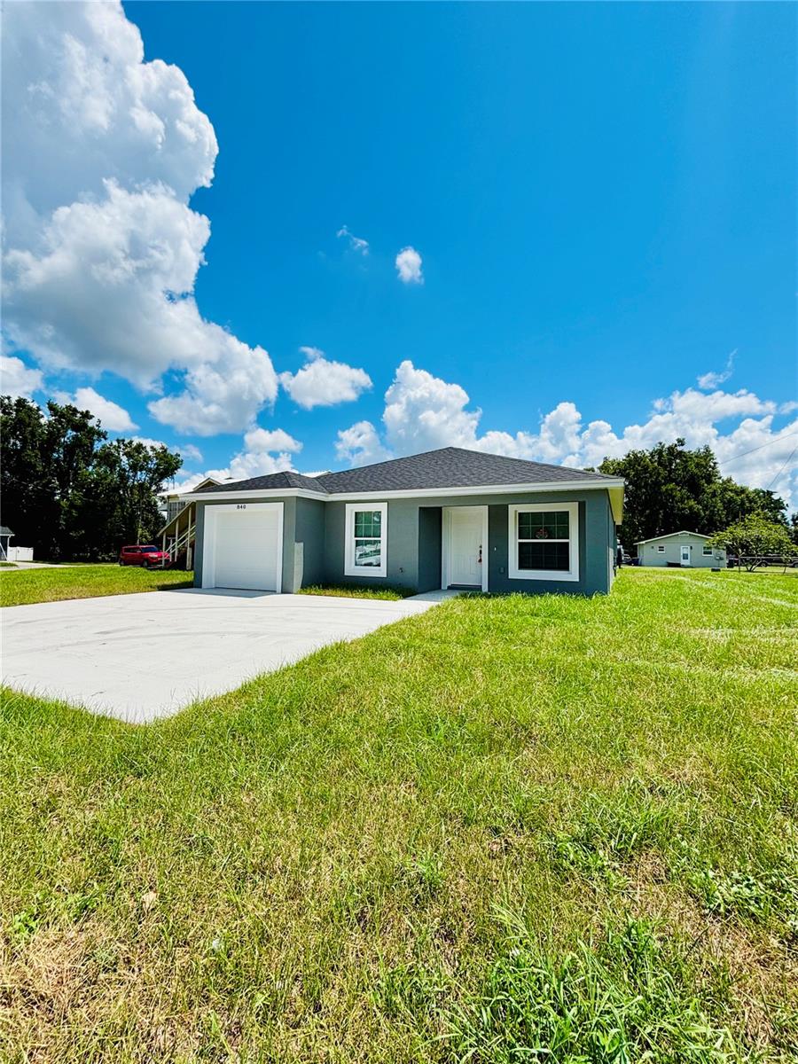 Built in 2025! This one-story home includes 3 bedrooms, 2 baths, inside laundry, 1173 sq feet of living space, and a one-car garage. Enjoy an open living room and kitchen with white cabinets and granite countertops. Stainless steel appliances. All rooms and baths include luxury wood looking vinyl plank flooring. Your owner's suite is complete with a walk-in closet and a private en-suite bath. There is no HOA to restrict you from bringing your boat or trailer and parking them on the back of the house. Right on US highway 17 makes it easy to communicate between Fort Meade, Bartow, Winter Haven, Mulberry and Lakeland area.
The seller is not the builder and cannot provide the builder's warranty. The house is under warranty for one year from 8/15/2025, according to Florida law (for every new build in Florida). It will automatically transfer to the new owner without any written documentation. The builder doesn't provide any mail- boxes with the house.