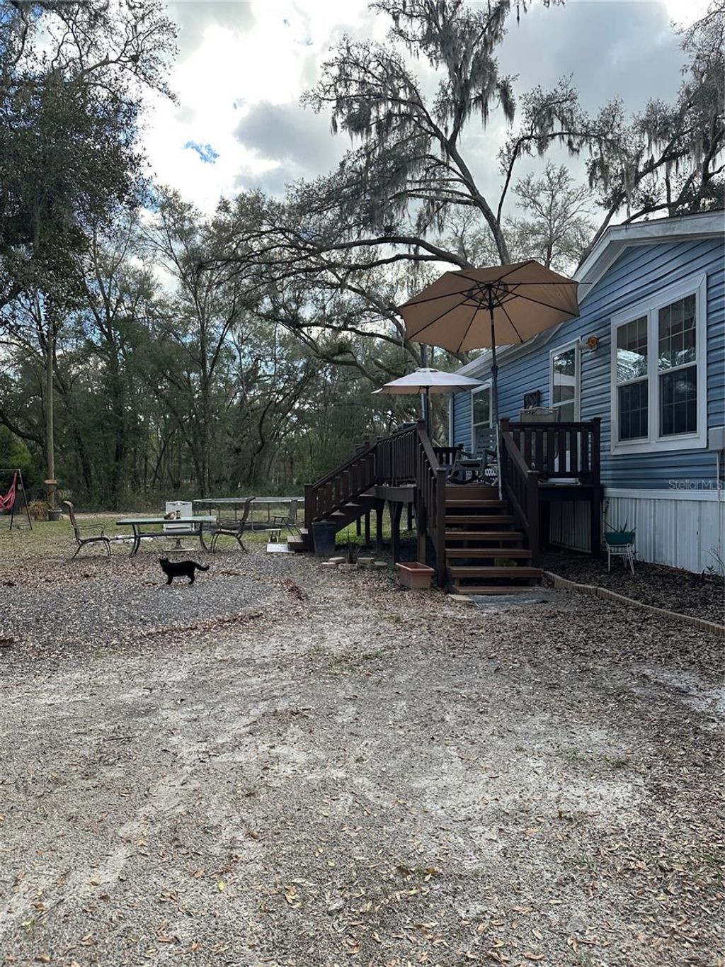 Photo of 7790 N Hamilton Road, Dunnellon, FL 34433 (MLS # O6386741)