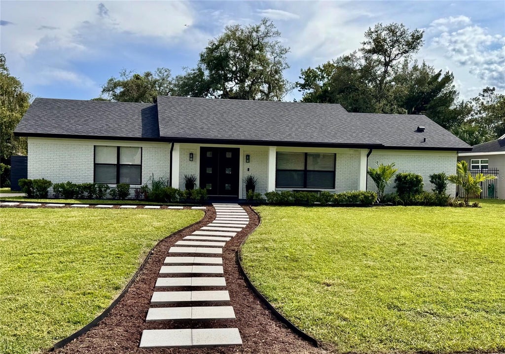 Photo of 1321 Carlton Street, Longwood, FL 32750 (MLS # O6439579)
