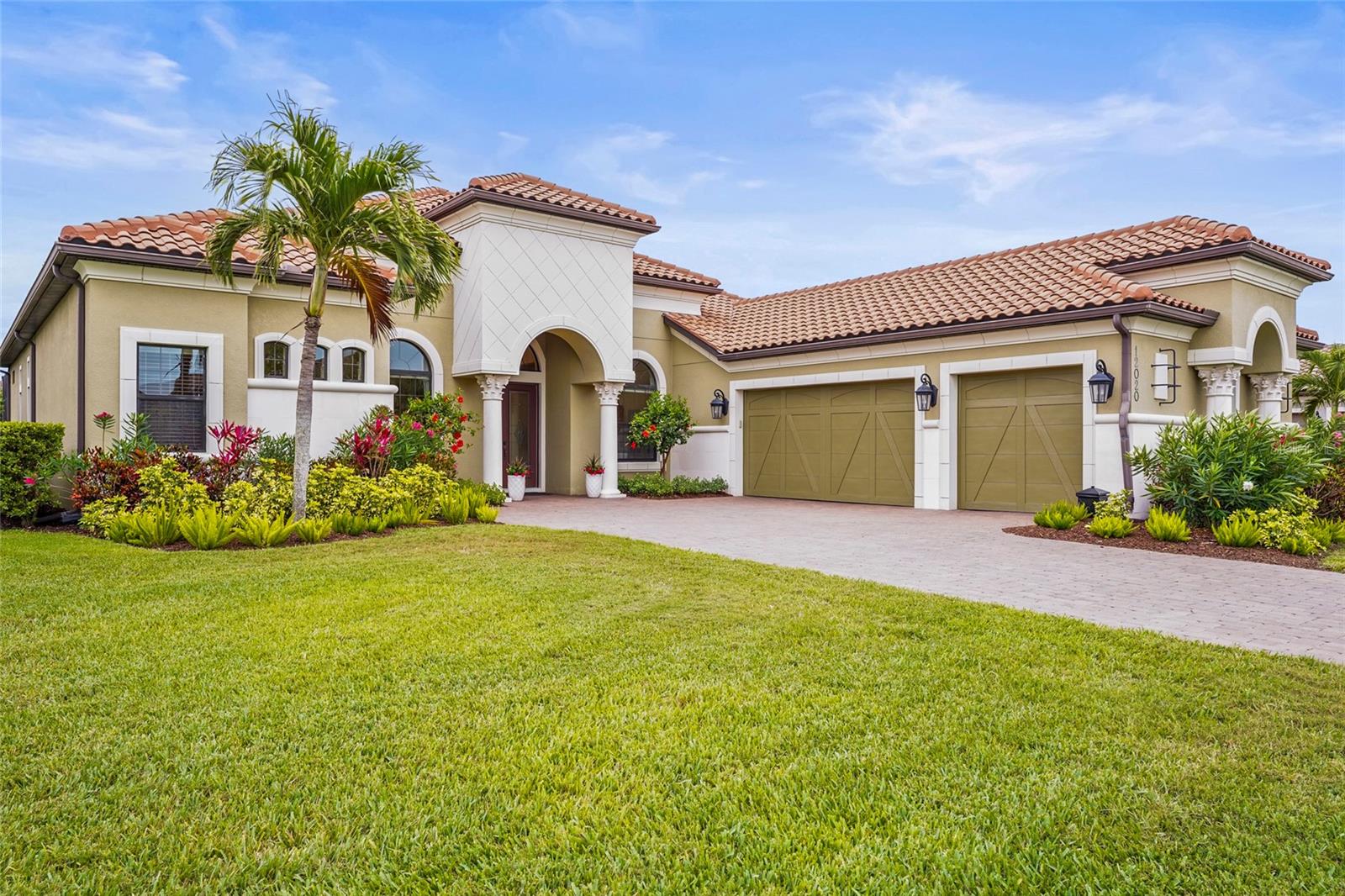 Rarely available Mercedes model pool home with a large bonus room, a pool and a spa in the much sought after community of Legacy Estates at Esplanade on Palmer Ranch. Boasting an amazing water view, this 3,639 sq.ft 3 bedroom, 3.5 bath, 3 car garage home offers a flexible floorplan with dining room, den, and a large bonus room that can be used as a media/ game room, second office or as an additional space for guests. Extensive home upgrades include heated pool and spa, hurricane impact windows, pocketing sliding doors from both the great room and bonus room, electric vehicle car charger, new interior paint, Hunter Douglas shades throughout, Culligan water filtration system, new landscaping, new pool pump/ lights and pool skimmer, and much more. The floorplan of this home is made for entertaining with the double convection oven a natural gas chef's kitchen opening to the aquarium windowed breakfast area. Pocketing glass sliding doors exit to the pool and spa. The covered lanai has natural gas outdoor kitchen. Esplanade on Palmer Ranch is the most highly sought-after gated community in South Sarasota. Known to cater to the active lifestyle, residents here enjoy an array of fabulous amenities, including a resort-style pool with cabanas and palm trees, eight pickle ball courts, two tennis courts, bocce ball, a children’s splash pad, two dog parks, walking trails, a lively Bahama Bar with a full-service restaurant and live music, plus a modern club house with a fully-equipped fitness center, games room, catering kitchen and wellness services. There’s also a full-time lifestyle manager who puts together a packed schedule of fun events and live entertainment. This community also puts you on the doorstep of the Legacy Trail and within a short drive from Siesta Key, America’s number one
beach as well as minutes from top-ranked Pine View School.