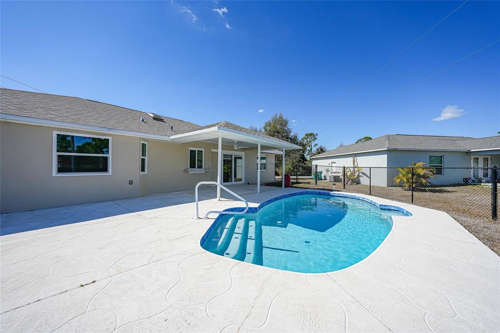 Photo of 6037 David Boulevard, Port Charlotte, FL 33981 (MLS # D6146496)