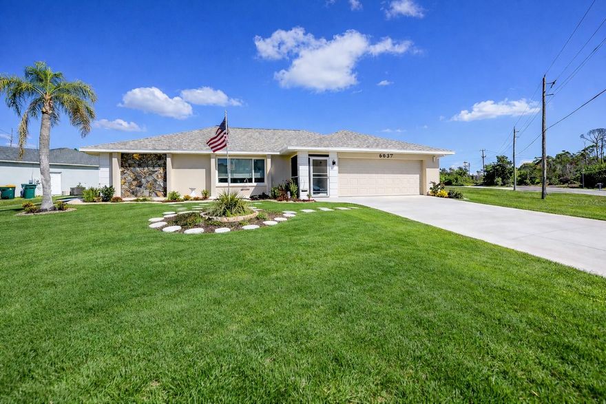 One or more photo(s) has been virtually staged. Move-in ready pool home in the boating community of Gulf Cove featuring a new roof (2024), brand new hurricane-impact windows, and a tankless water heater, all located in an X flood zone. This beautifully fully renovated 3-bedroom, 2-bathroom home with a 2-car garage offers the perfect blend of modern upgrades and the relaxed Southwest Florida lifestyle.

Step inside to a bright open floor plan with luxury vinyl plank flooring throughout, complemented by coastal-inspired tones of blues and soft grays that create a light, airy Florida feel. The spacious kitchen is designed for both everyday living and entertaining, featuring granite countertops, stainless steel appliances, and abundant cabinetry.

The split-bedroom layout provides privacy for both owners and guests. The primary suite is generously sized, offering a large walk-in closet and an updated ensuite bathroom with a walk-in shower and double-sink vanity. The guest bathroom has also been completely updated, continuing the home’s modern finishes throughout.

Step outside to your private backyard oasis, where the resurfaced pool is perfect for relaxing or entertaining. The home sits on a corner lot, offering additional yard space and privacy.

Residents of Gulf Cove have the option to join the private community boat ramp and waterfront park, providing direct access to the Myakka River, Charlotte Harbor, and the Gulf of Mexico—perfect for boating, fishing, and kayaking. Membership is very affordable at just $75 per year for the boat ramp and $75 per year for the park.

Conveniently located about 20 minutes from Englewood Beach and within 10 minutes of shopping, dining, golf courses, marinas, and everyday conveniences, this home offers the perfect combination of modern upgrades, boating access, and the Southwest Florida coastal lifestyle.